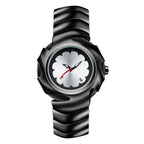 Reloj de Vanguardia: Diseño Escultórico en Acero con Esfera Minimalista.