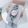 Reloj de Botón Retro: La Pulsera que Marca el Tiempo